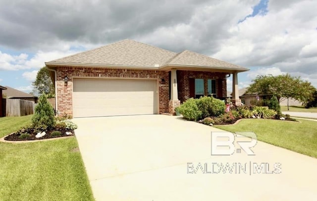 ranch-style house featuring brick siding, a front lawn, concrete driveway, and an attached garage