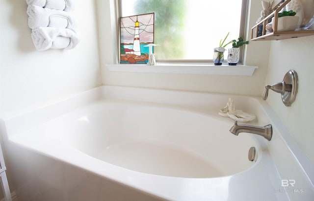full bath with a garden tub