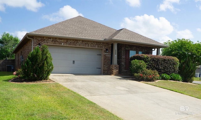 ranch-style home with a front yard, a garage, a shingled roof, driveway, and brick siding