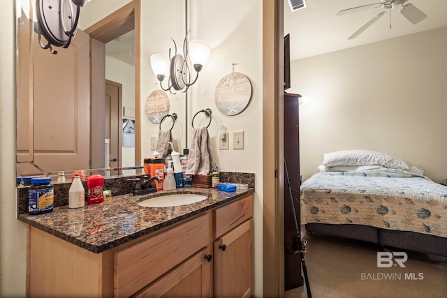 bathroom with vanity and ceiling fan