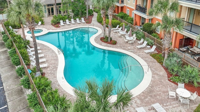 view of pool featuring a patio area