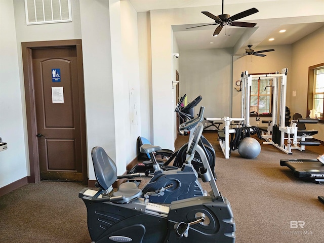 exercise room with ceiling fan