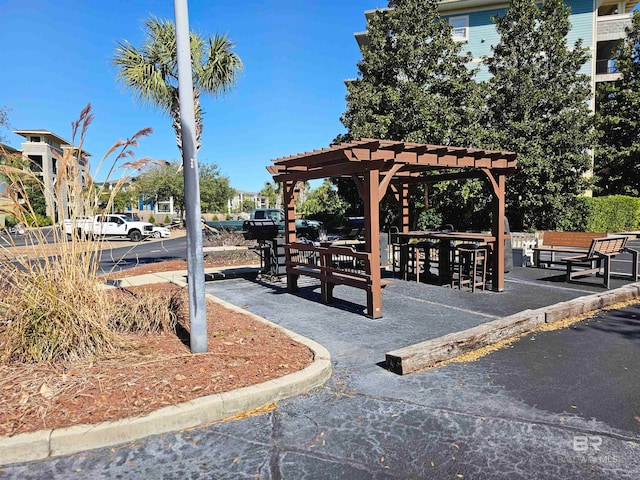 view of property's community with a pergola