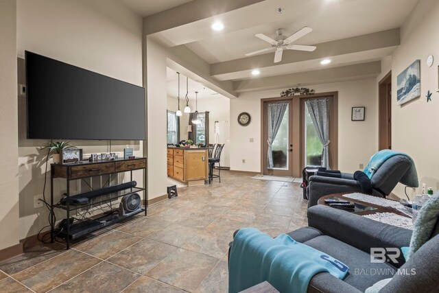 living room featuring french doors and ceiling fan