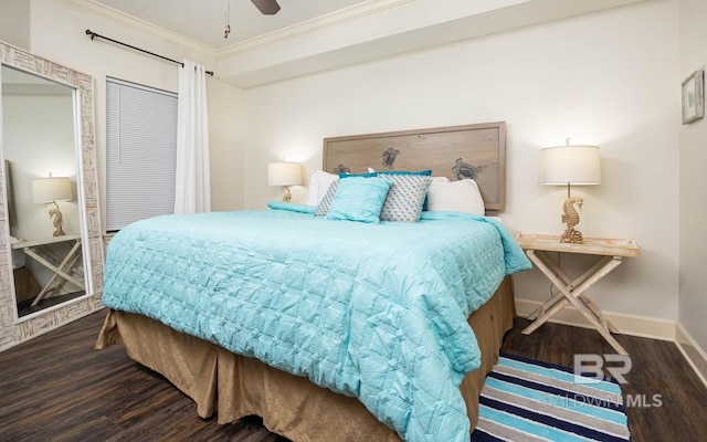 bedroom with ceiling fan, dark hardwood / wood-style floors, and crown molding