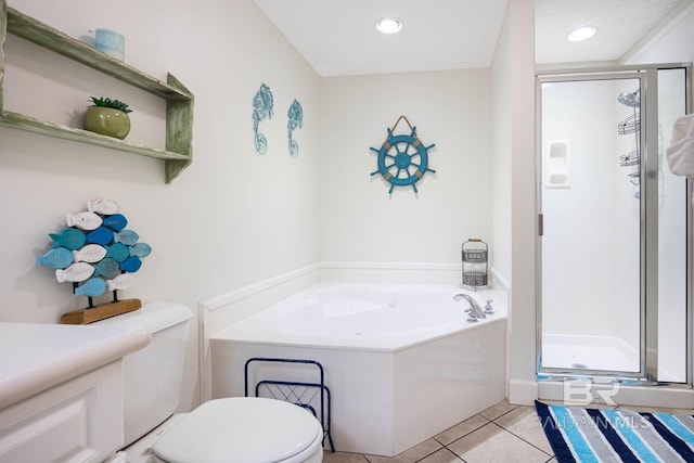 bathroom with toilet, tile patterned floors, and independent shower and bath