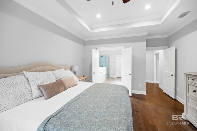 bedroom featuring crown molding, ceiling fan, a tray ceiling, and dark hardwood / wood-style flooring