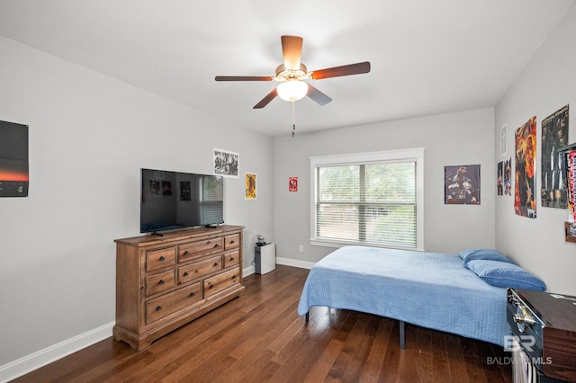 bedroom with dark wood-type flooring and ceiling fan