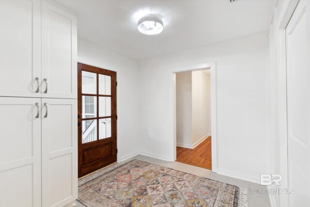 view of tiled foyer entrance