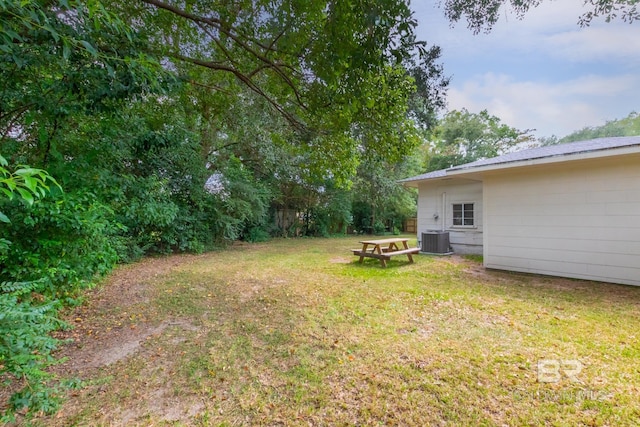 view of yard featuring central AC unit