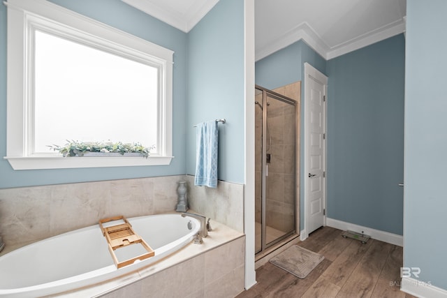 bathroom featuring hardwood / wood-style flooring, independent shower and bath, and crown molding