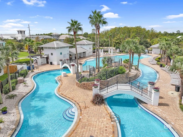 view of swimming pool with a water slide