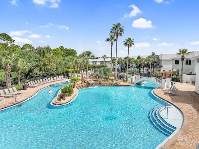 view of pool featuring a patio