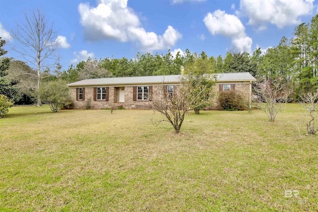 ranch-style home with a front yard