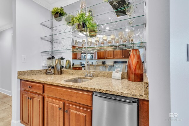 23450 Perdido Beach Blvd Unit 2707, Orange Beach, AL 36561 - bar featuring crown molding, appliances with stainless steel finishes, sink, and light stone counters