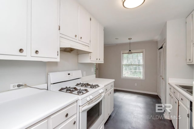 kitchen with white cabinets, hanging light fixtures, and white range with gas cooktop