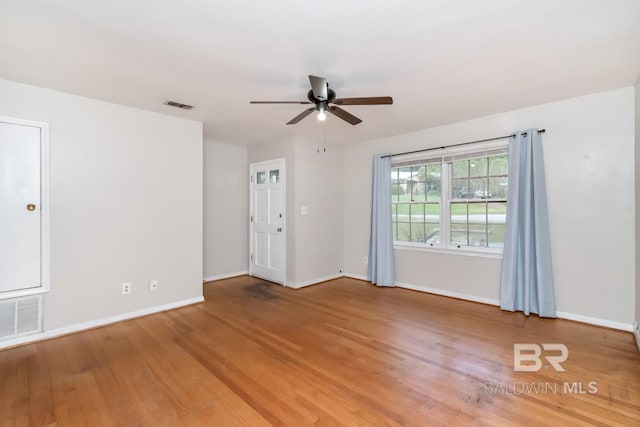 unfurnished room featuring wood-type flooring and ceiling fan