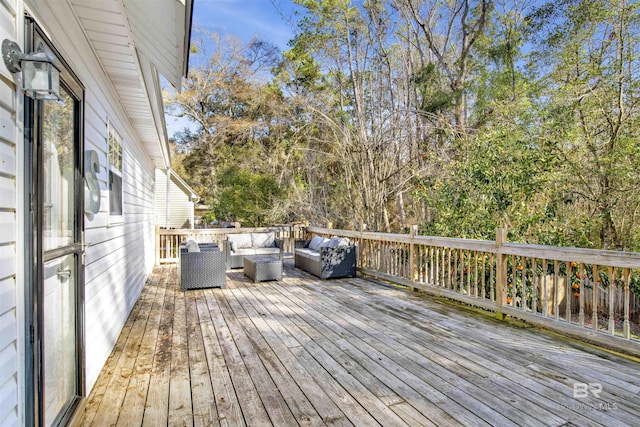 wooden deck featuring an outdoor living space