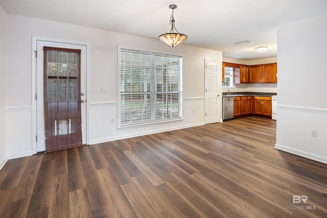 interior space with sink and dark hardwood / wood-style flooring