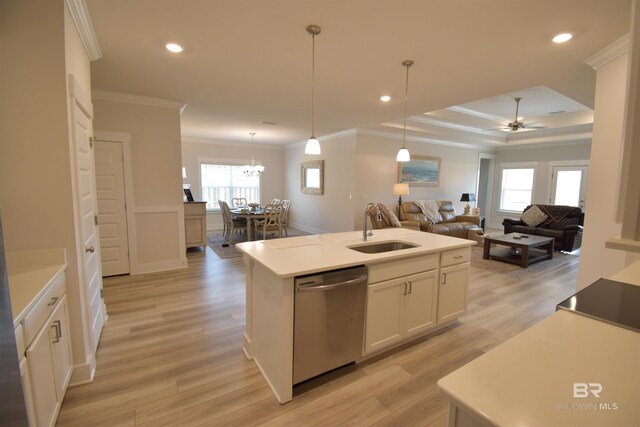 1123 Pheasant Cir, Foley, AL 36535 - kitchen with crown molding, a sink, light wood-style flooring, ceiling fan with notable chandelier, and stainless steel dishwasher