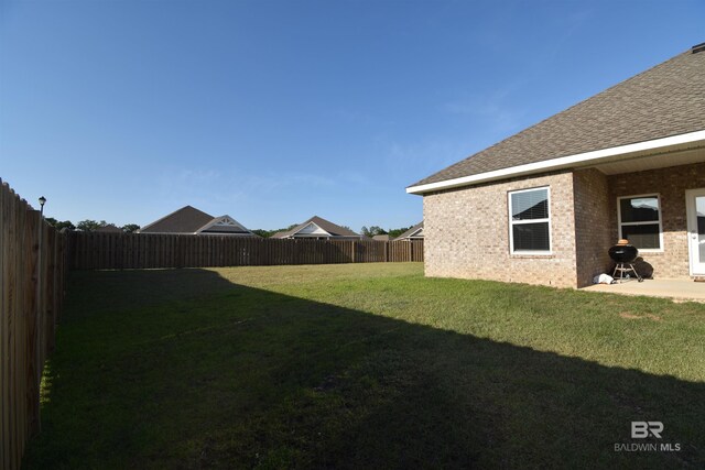 1123 Pheasant Cir, Foley, AL 36535 - view of yard with a patio and a fenced backyard