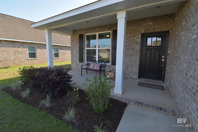 1123 Pheasant Cir, Foley, AL 36535 - property entrance featuring covered porch and brick siding