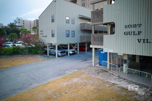 view of building exterior with a carport