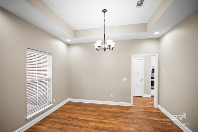 10210 Lyttleton Loop, Lillian, AL 36549 - spare room with recessed lighting, a notable chandelier, baseboards, and wood finished floors