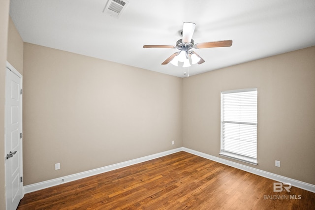 10210 Lyttleton Loop, Lillian, AL 36549 - unfurnished room with baseboards, visible vents, ceiling fan, and wood finished floors