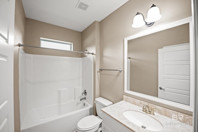 10210 Lyttleton Loop, Lillian, AL 36549 - full bathroom featuring toilet, washtub / shower combination, vanity, and visible vents