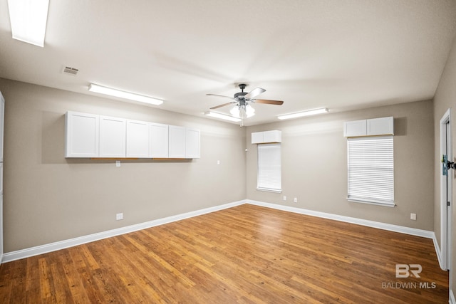 10210 Lyttleton Loop, Lillian, AL 36549 - empty room with a ceiling fan, baseboards, and wood finished floors