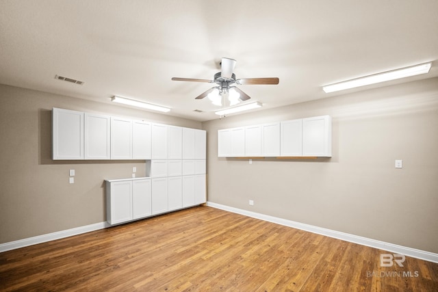 10210 Lyttleton Loop, Lillian, AL 36549 - spare room featuring light wood-type flooring, visible vents, baseboards, and a ceiling fan