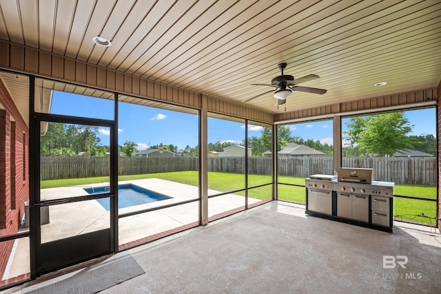 10210 Lyttleton Loop, Lillian, AL 36549 - unfurnished sunroom featuring a ceiling fan and plenty of natural light