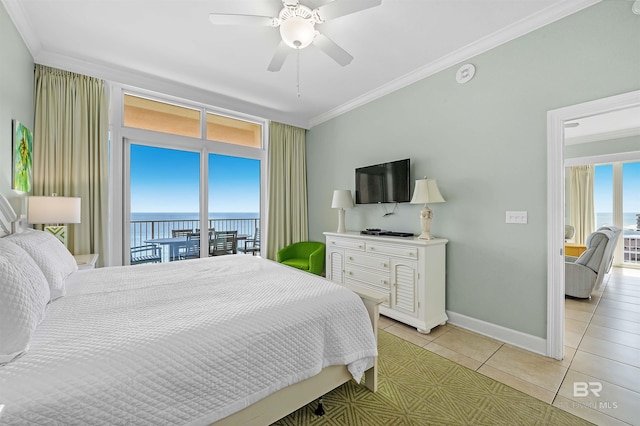 bedroom featuring light tile patterned floors, ornamental molding, and access to outside