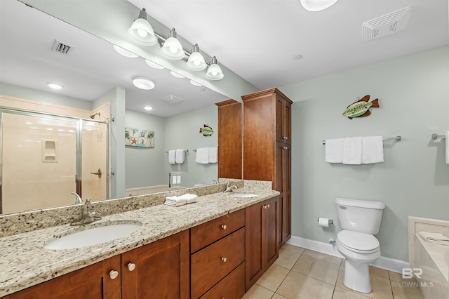 bathroom with visible vents, a shower stall, and a sink