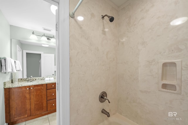 bathroom featuring vanity,  shower combination, visible vents, and tile patterned flooring