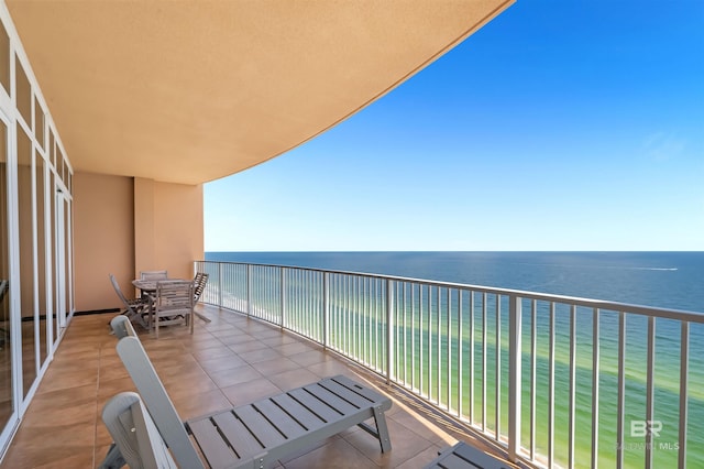 balcony featuring a water view