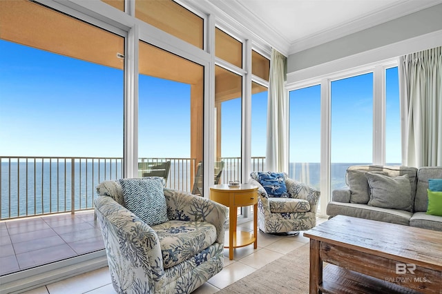 sunroom / solarium featuring a healthy amount of sunlight and a water view