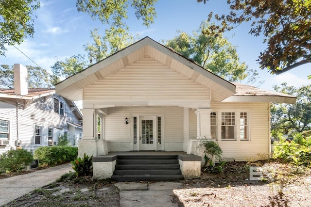 bungalow-style house featuring covered porch