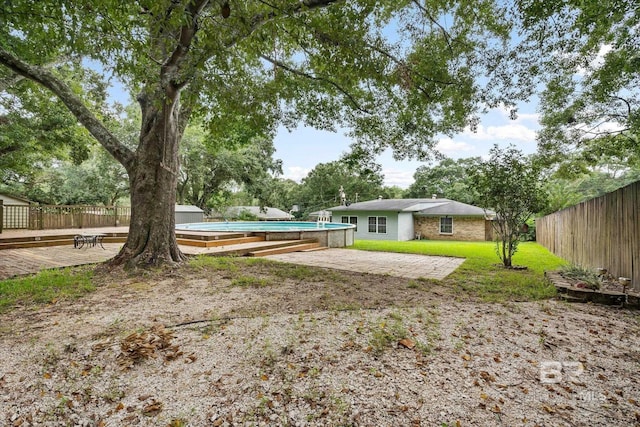 5175 W Somerset Dr, Mobile, AL 36619 - view of yard with an outdoor pool and a wooden deck