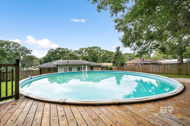 5175 W Somerset Dr, Mobile, AL 36619 - view of pool with a fenced backyard and a deck