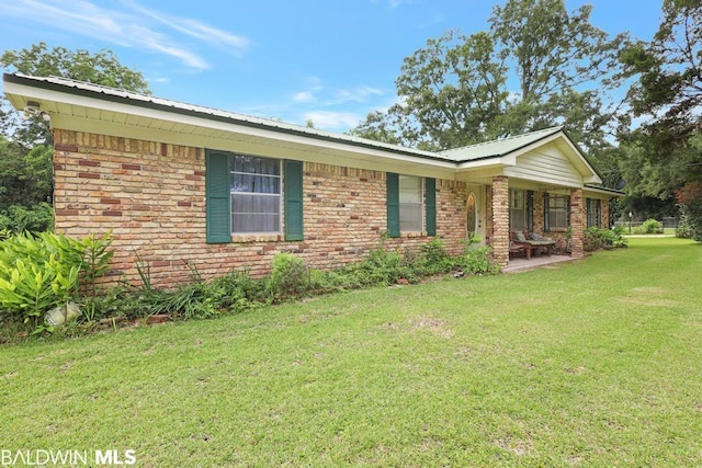 exterior space with a lawn