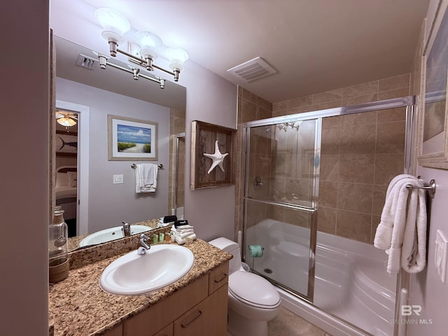 28105 Perdido Beach Blvd Unit C211, Orange Beach, AL 36561 - full bathroom with toilet, a stall shower, vanity, and visible vents