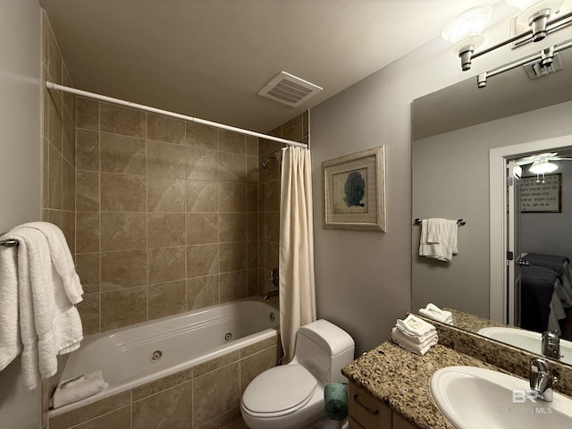 28105 Perdido Beach Blvd Unit C211, Orange Beach, AL 36561 - full bath featuring visible vents, toilet, vanity, and tiled shower / bath combo