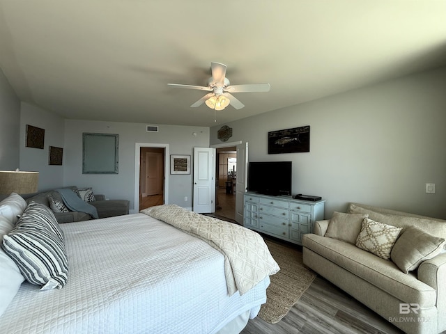 28105 Perdido Beach Blvd Unit C211, Orange Beach, AL 36561 - bedroom with wood finished floors, a ceiling fan, and visible vents