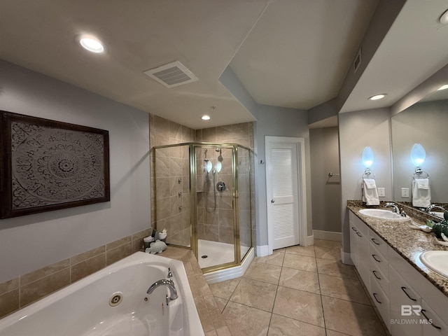 28105 Perdido Beach Blvd Unit C211, Orange Beach, AL 36561 - full bath featuring a shower stall, visible vents, a sink, and a whirlpool tub