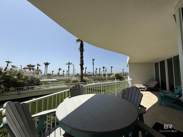 28105 Perdido Beach Blvd Unit C211, Orange Beach, AL 36561 - balcony featuring outdoor dining area