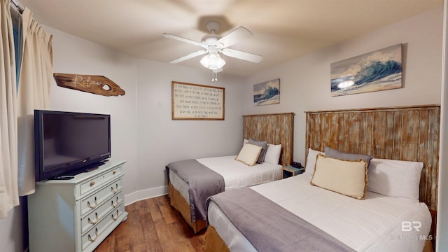 28105 Perdido Beach Blvd Unit C211, Orange Beach, AL 36561 - bedroom featuring baseboards, a ceiling fan, and wood finished floors