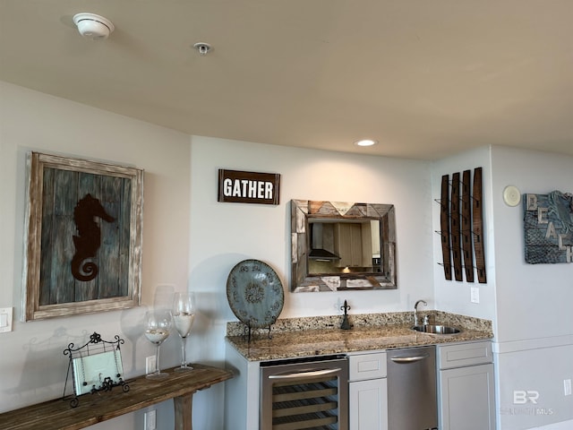 28105 Perdido Beach Blvd Unit C211, Orange Beach, AL 36561 - bar featuring indoor wet bar, wall chimney range hood, recessed lighting, wine cooler, and a sink