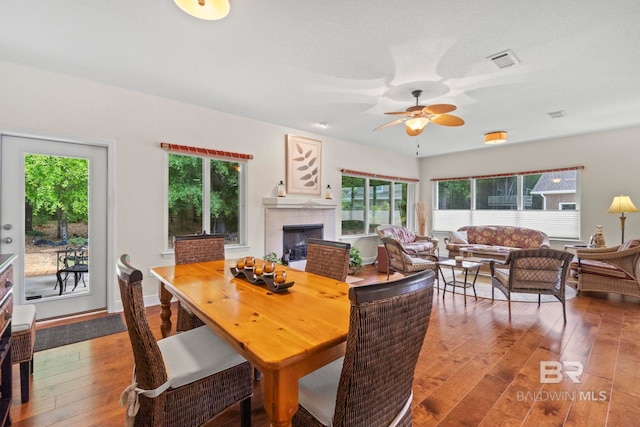 8664 Foxtail Loop, Pensacola, FL 32526 - dining area featuring hardwood / wood-style flooring, healthy amount of natural light, and ceiling fan
